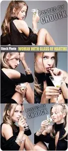 Woman with glass of martini - Stock Photo