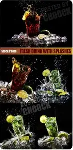 Stock Photo: Fresh drink with splashes