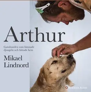 «Arthur : Gatuhunden som lämnade djungeln och hittade hem» by Val Hudson,Mikael Lindnord