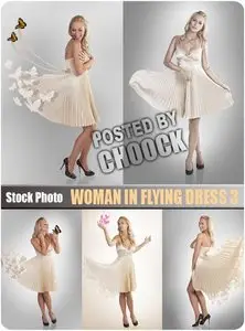 Woman in flying dress 3 - Stock Photo