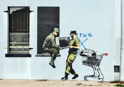 Banksy - Banging Your Head Against a Brick Wall