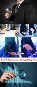 Photos - Businessman with Magnifying Glass