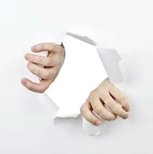 Shutterstock - Hands Ripping a Paper