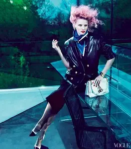 Lara Stone & Joan Smalls by Mert Alas & Marcus Piggott for Vogue US July 2012