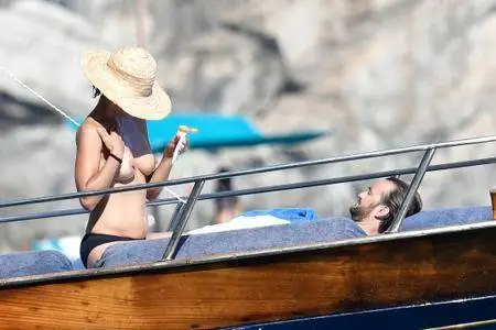 Sophie Marceau topless with Cyril Lignac in Capri on July 31, 2016