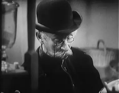 U snedeného krámu / The Ruined Shopkeeper (1933)