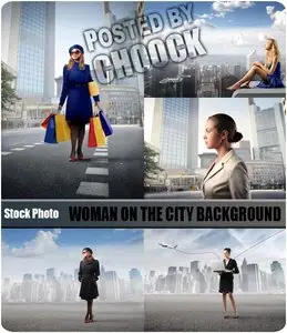 Woman on the city background - Stock Photo