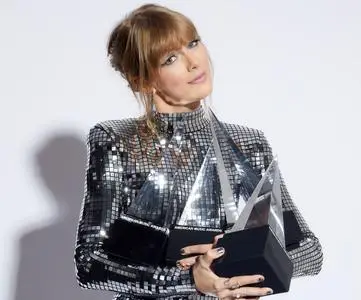 Taylor Swift by Rich Fury at the 2018 American Music Awards on October 9, 2018 in Los Angeles, California