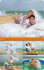 Bride and groom on the beach photo