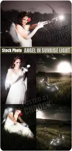 Stock Photo: Angel in sunrise light