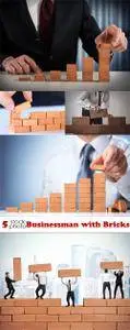 Photos - Businessman with Bricks