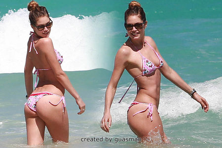 Doutzen Kroes - Bikini candids on the beach in Miami April 28, 2013