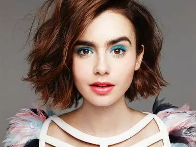 Lily Collins by Naj Jamai for Glamour UK May 2015