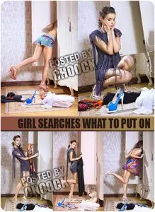 Stock Photo: Girl searches what to put on