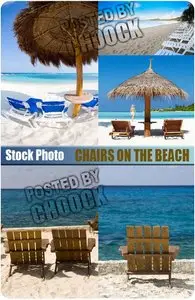 Stock Photo: Chairs on the beach