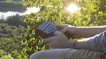 How To Play The Thumb Harp ( Kalimba )