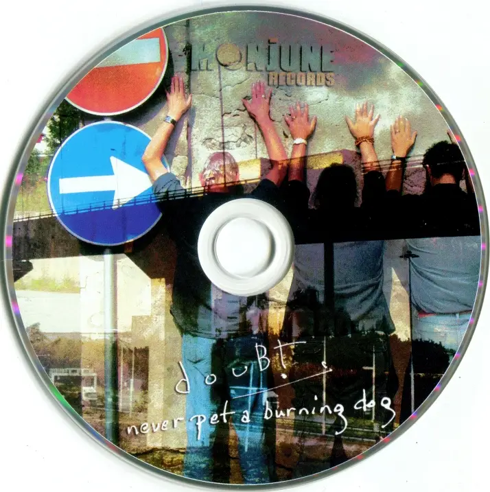 Doubt Never Pet A Burning Dog (2010) / AvaxHome