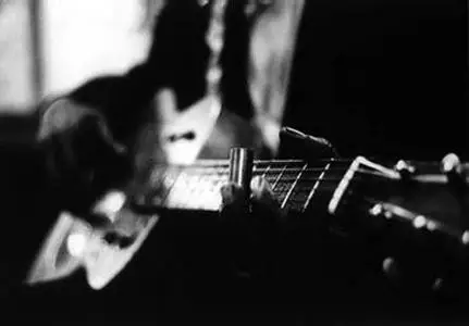 Game masterpieces on an acoustic guitar (2003)