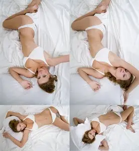Girl laying on a Bed - HQ Stock Photos