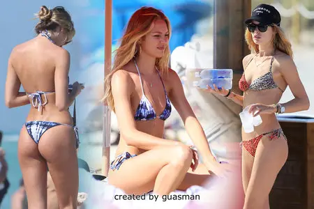 Candice Swanepoel & Doutzen Kroes - Bikini candids on the beach in Miami March 23, 2013