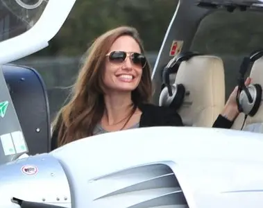 Angelina Jolie boards a plane for a flying lesson in Hampshire 09-23-11