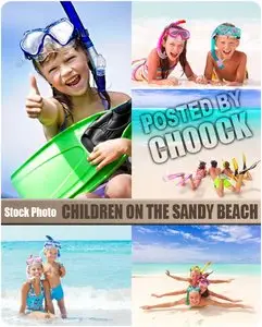 Children on the sandy beach - Stock Photo