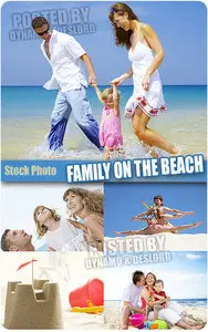 Family on the beach - UHQ Stock Photo