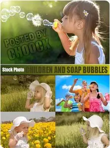 Children and soap bubbles - Stock Photo