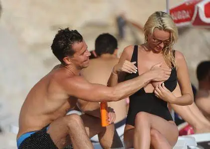 Rhian Sugden with Oliver Mellor on the beach in Turkey on August 18, 2016