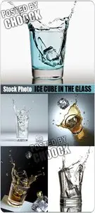 Ice cube in the glass - Stock Photo