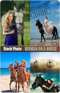 Woman on a horse - Stock Photo