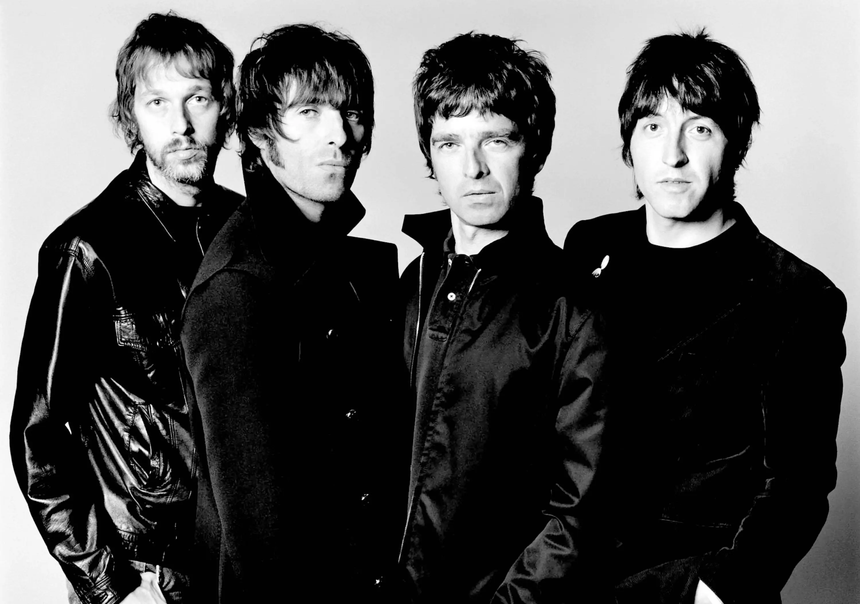 Зарубежная сборка слушать. Oasis the Band 2002. Oasis группа 1977. The Stranglers Британская рок-группа. Оазис группа и Битлз.