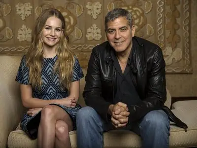 Britt Robertson and George Clooney by Mario Anzuoni for Los Angeles Times May 26, 2015