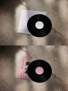 Vinyl Record With Sleeve Mockup on a Concrete Background 544817386