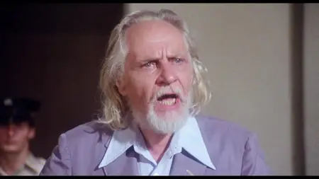 The Man in the Glass Booth (1975)