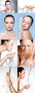 Splashes of water on the face of beautiful sexy woman