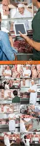 Butcher behind the counter Stock photo